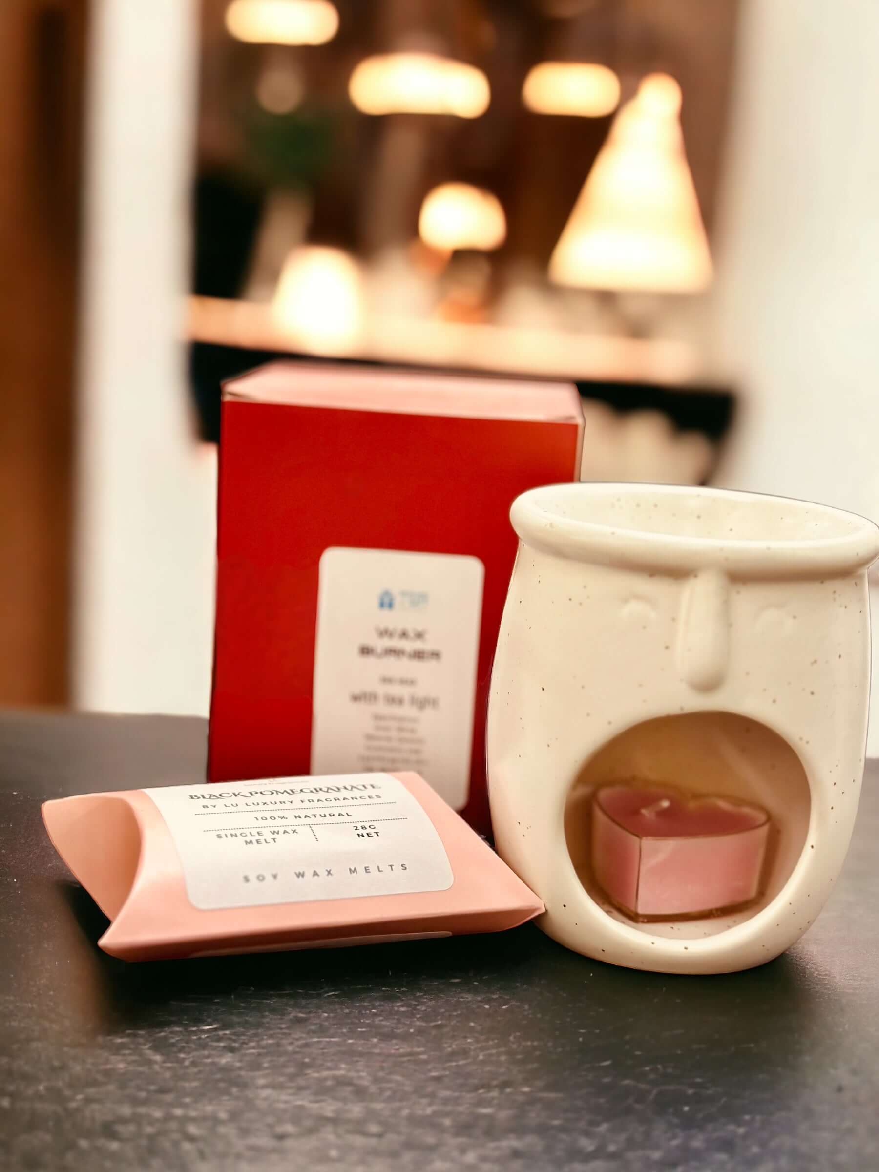 This luxurious set includes a wax burner, a designer inspired scented wax melt, and an unscented tea light, all packaged in a beautifully boxed gift. Enjoy the soothing scents and ambiance with our expertly crafted set.