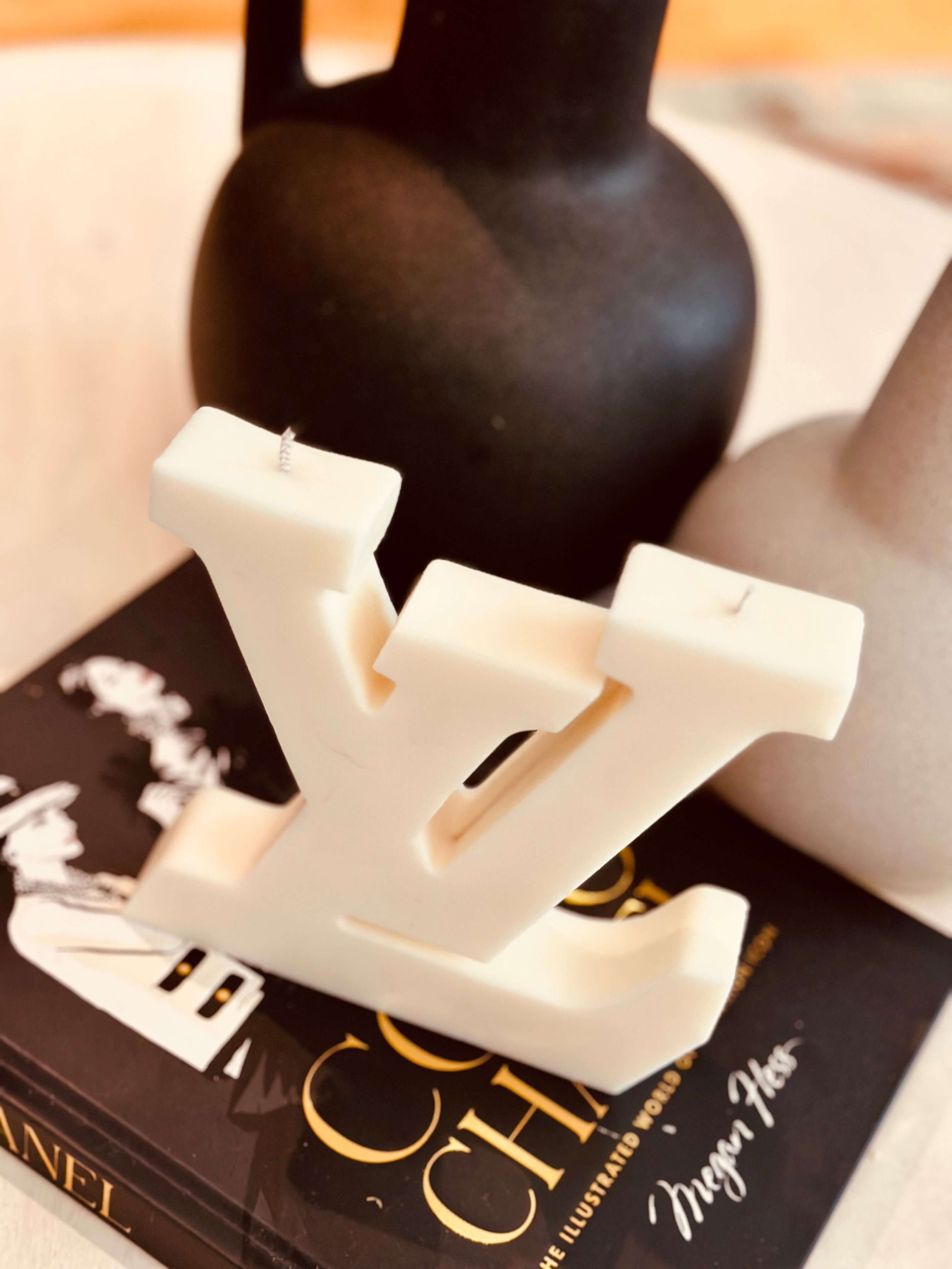 This Designer Inspired Monogram Candle is the perfect addition to any stylish and sophisticated atmosphere.  With its unique Monogram design and high-quality materials, it adds a touch of luxury and elegance to any room. Expertly crafted with attention to detail, it exudes professionalism and class.