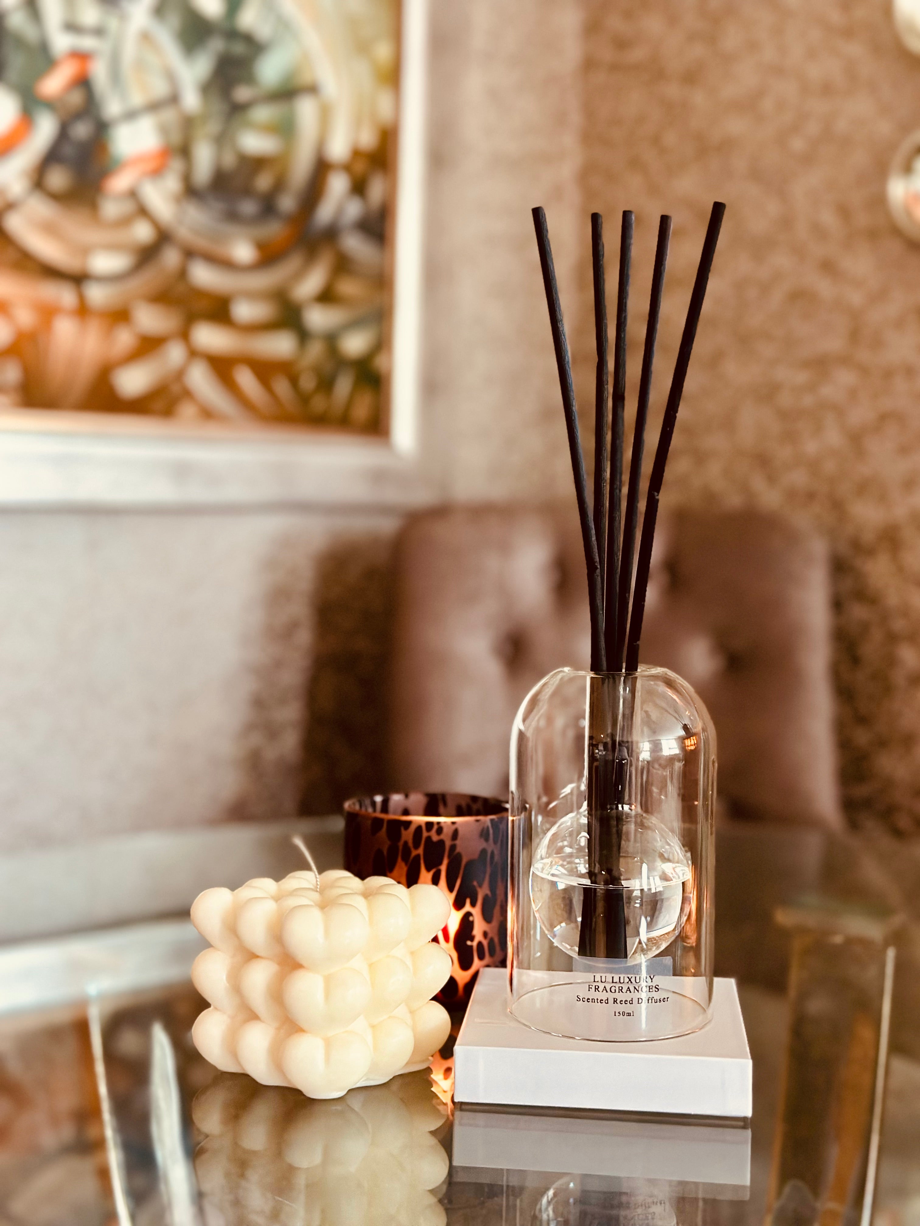 Designed with both elegance and innovation in mind, this Clear Glass Reed Diffuser boasts a sleek dome shape and built-in 120ml bottle for a seamless and sophisticated look.