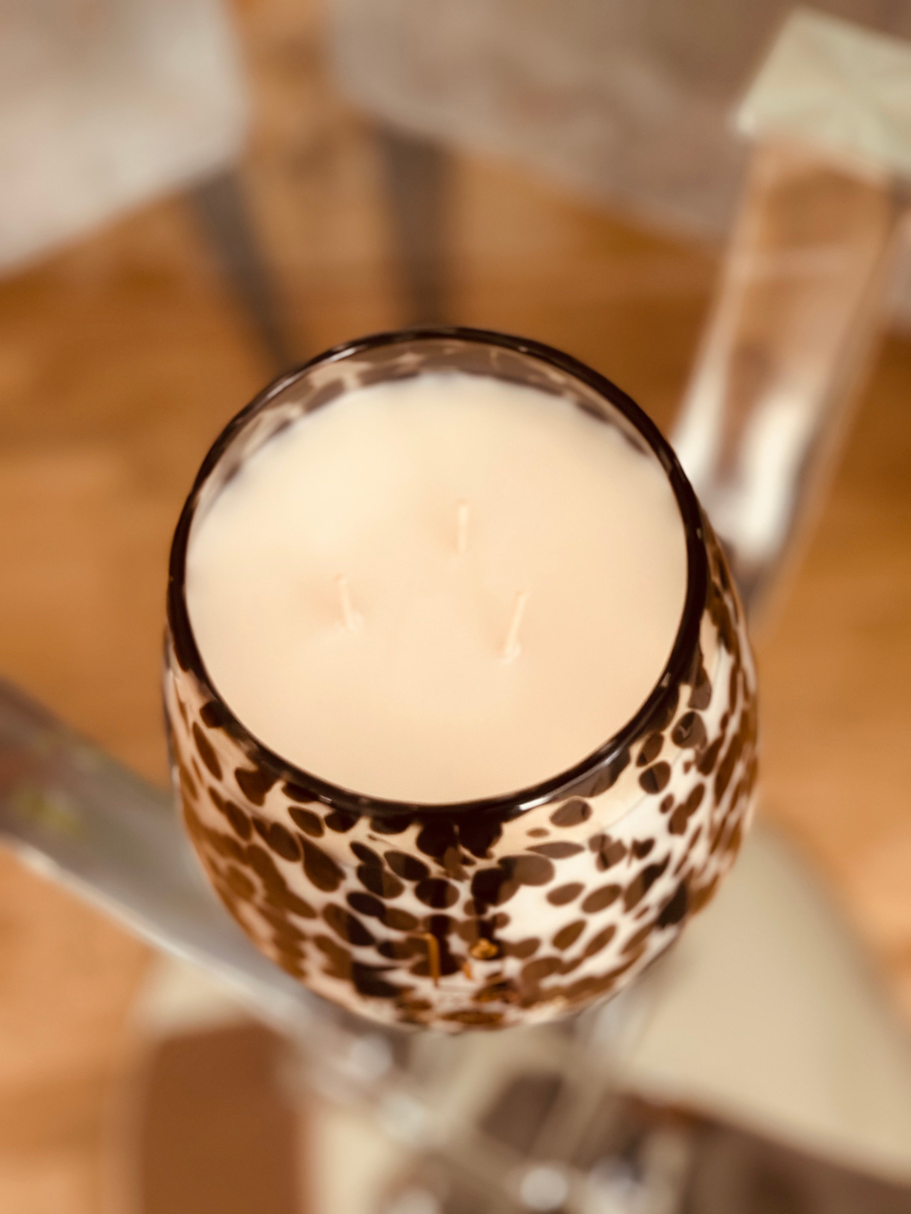 Our Jumbo Renee Glass Soy Candle in Cheetah print is a standout choice for upgrading your home decor. Crafted with a hand mould production process, our candle boasts a durable and secure jar, setting it apart from competitors. You can indulge in over 150 hours of natural, scented bliss with 1300g of wax and an array of fragrances, all while feeling good about using a vegan and cruelty-free product that is free of silicon and parabens.