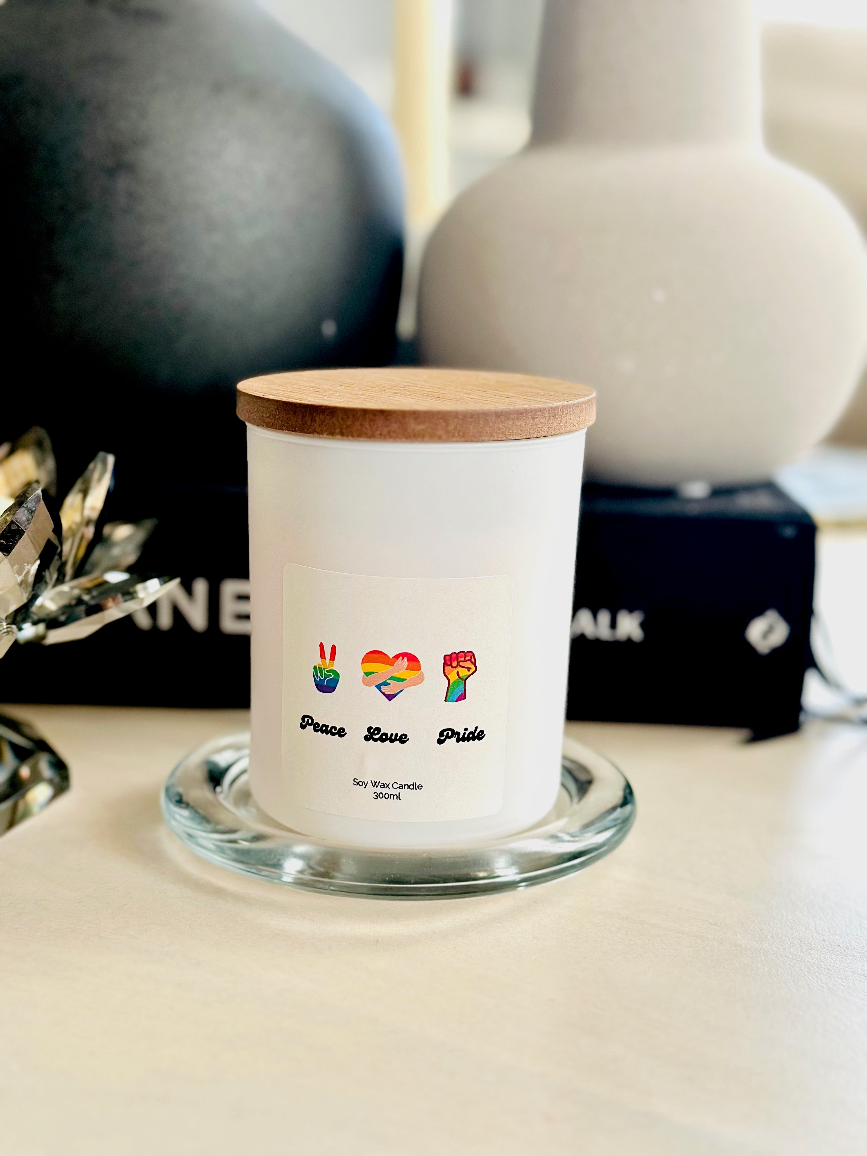 Enhance your space with our Pride Scented Glass Candle, a testament to inclusivity and joy. Embodying the essence of pride, each candle bears a cherished word for all to aspire towards and honor. Join us in spreading love and acceptance through the warm and inviting glow of our scented candle.