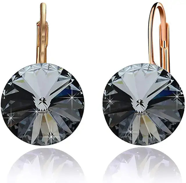 Experience timeless elegance with our Crystal Drop Earrings. These stunning earrings feature high-quality crystals that catch the light and add a touch of sparkle to any outfit. With their classic design and versatile style, these earrings are perfect for any occasion. Elevate your look with our Crystal Drop Earrings.